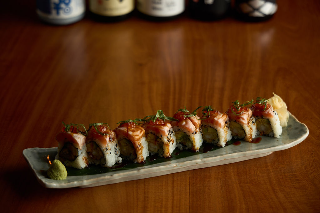 Sake served alongside fresh sushi at Anaba