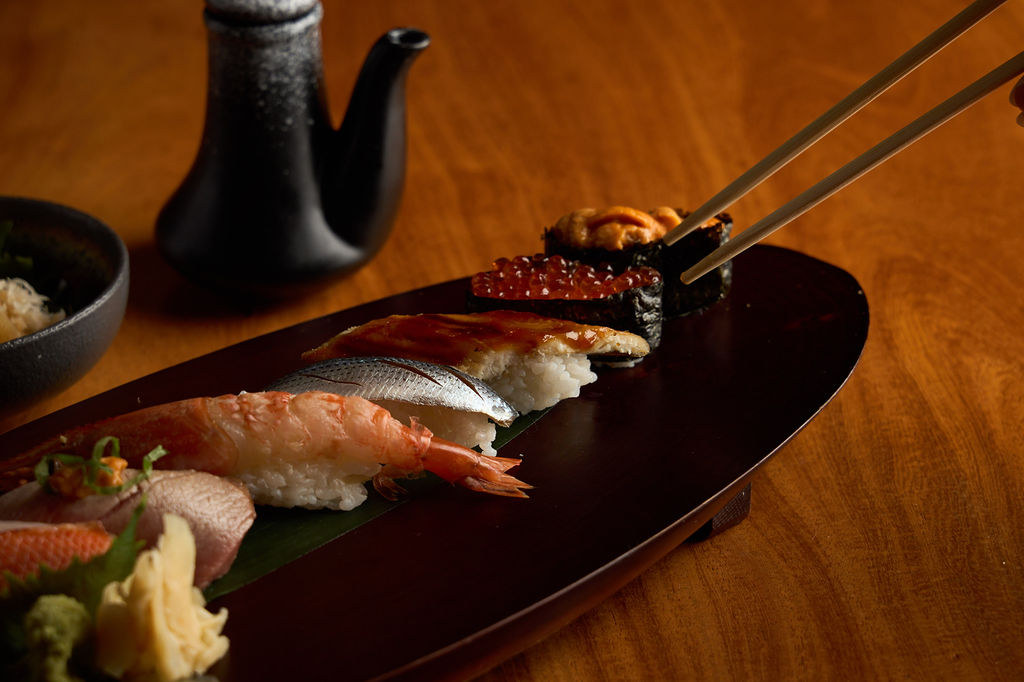 Anaba omakase — premium nigiri selection on a wooden board
