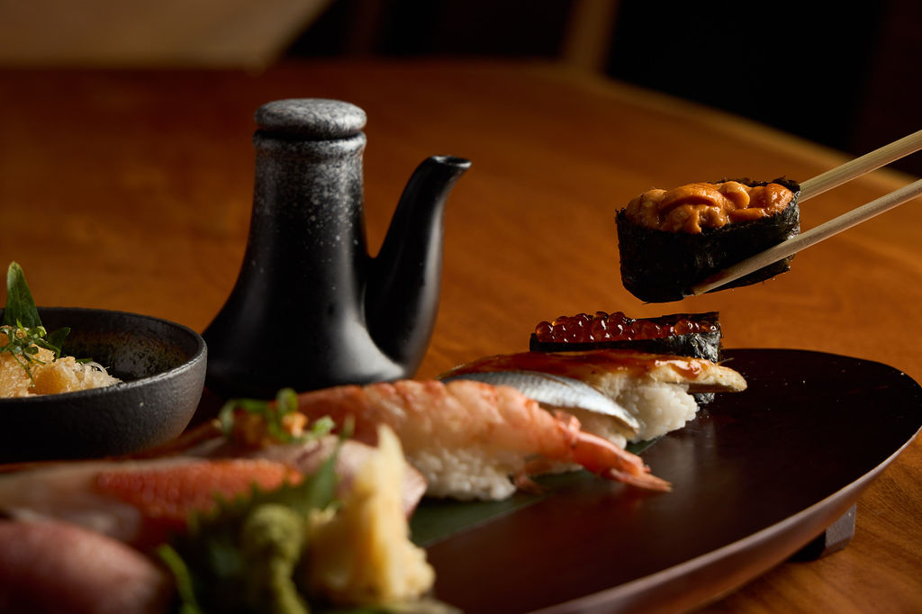 Close-up of hand-pressed nigiri with premium fish from Japan