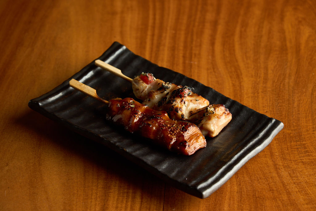 Anaba yakitori bowl with charcoal-grilled skewers over rice